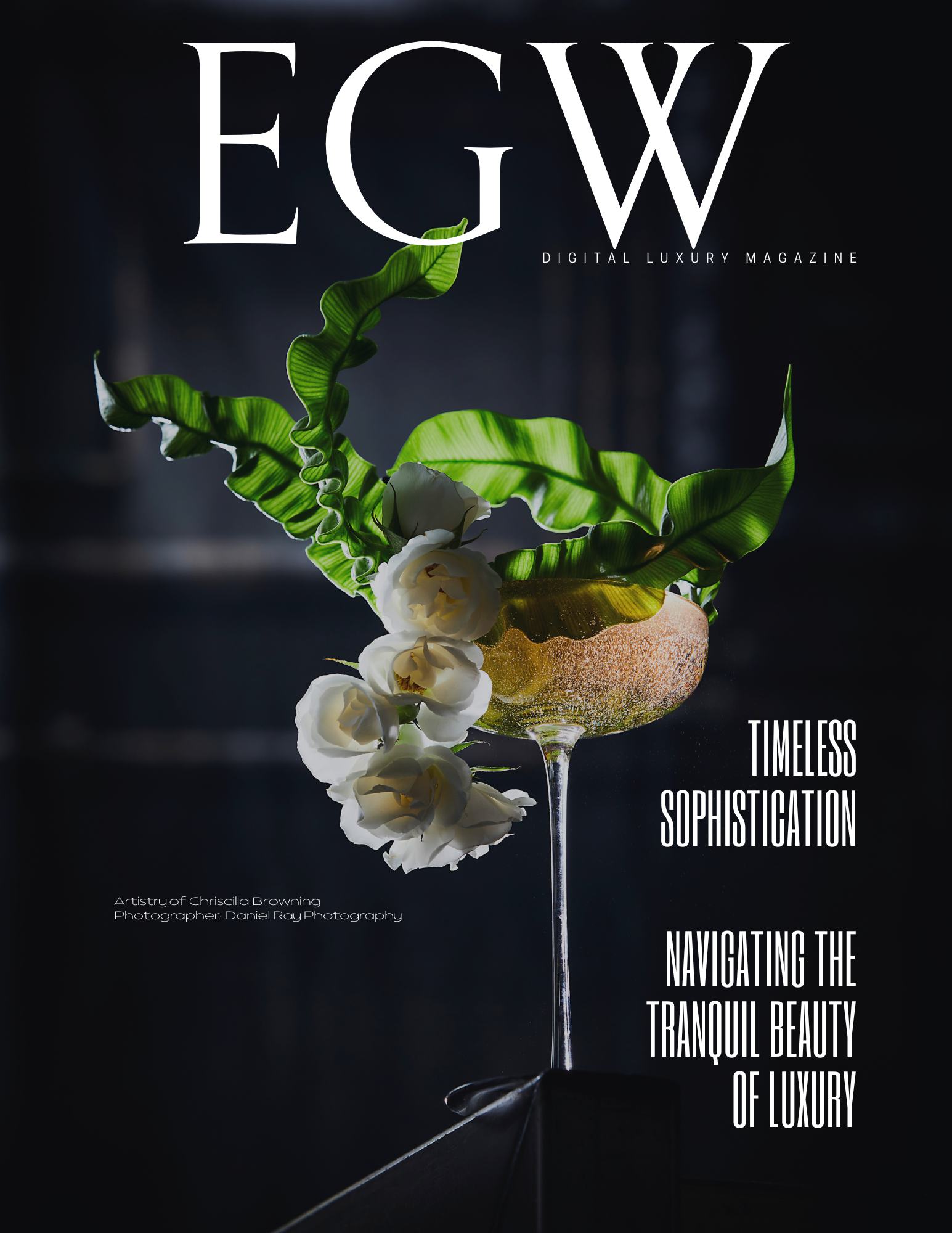 Cover of EGW digital luxury magazine featuring a floral arrangement in a glass goblet with green leaves and white flowers against a dark background, with the headline 'Timeless Sophistication Navigating the Tranquil Beauty of Luxury' and credit to artist Chricilla Browning and photographer Daniel Ray Photography.