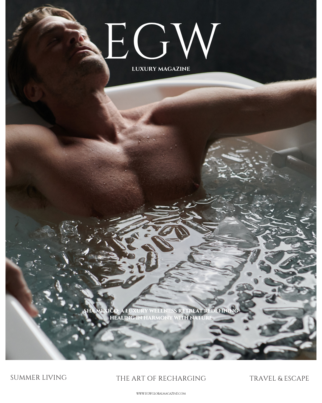 A middle-aged man with gray hair and a beard relaxing in a bathtub filled with water and ice, with his eyes closed, head resting back against the tub, captured in a luxury magazine cover.