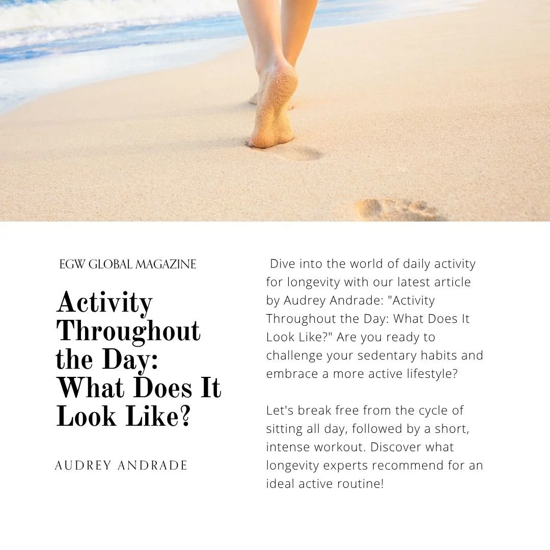 Person walking barefoot on sandy beach near the ocean