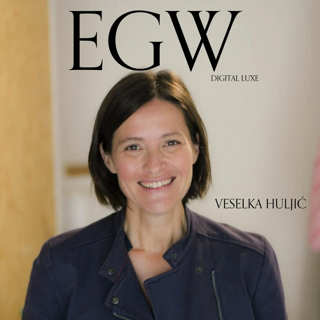 Magazine cover featuring a smiling woman with short dark hair, wearing a dark jacket, with large black letters 'EGW' at the top and smaller text 'DIGITAL LUXE' and 'VESELKA HULJIĆ' on the cover.