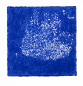 A blue square with a textured, speckled white pattern in the center