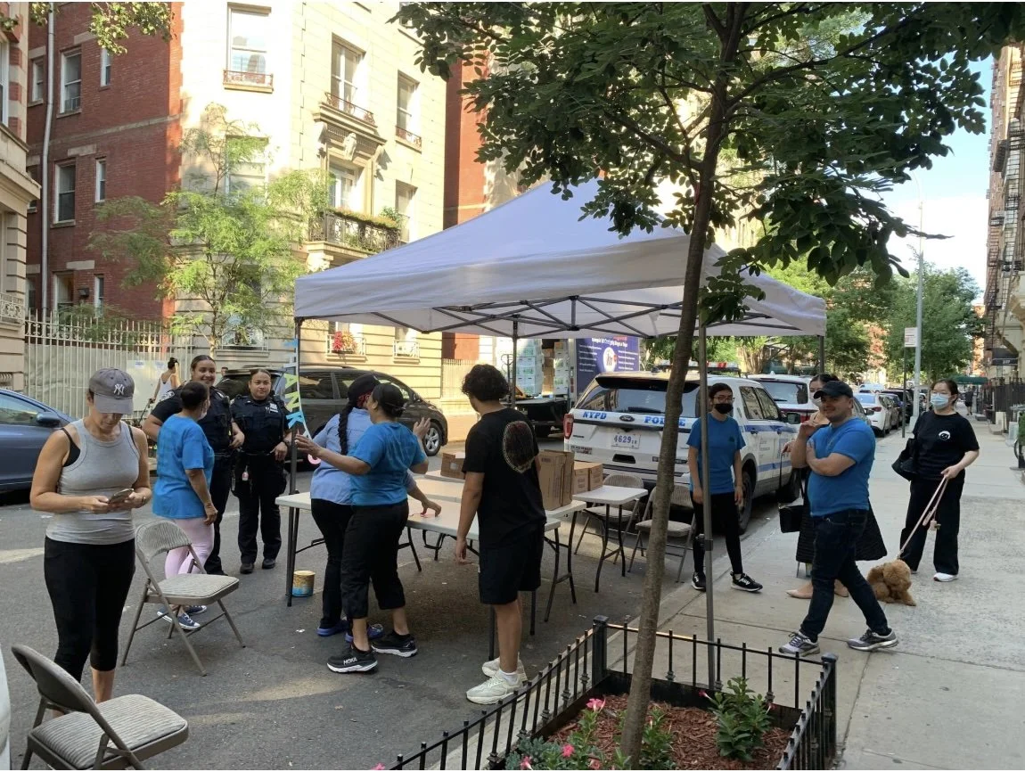 Teenagers and adults from all over Manhattan come together to set up the pantry together.
