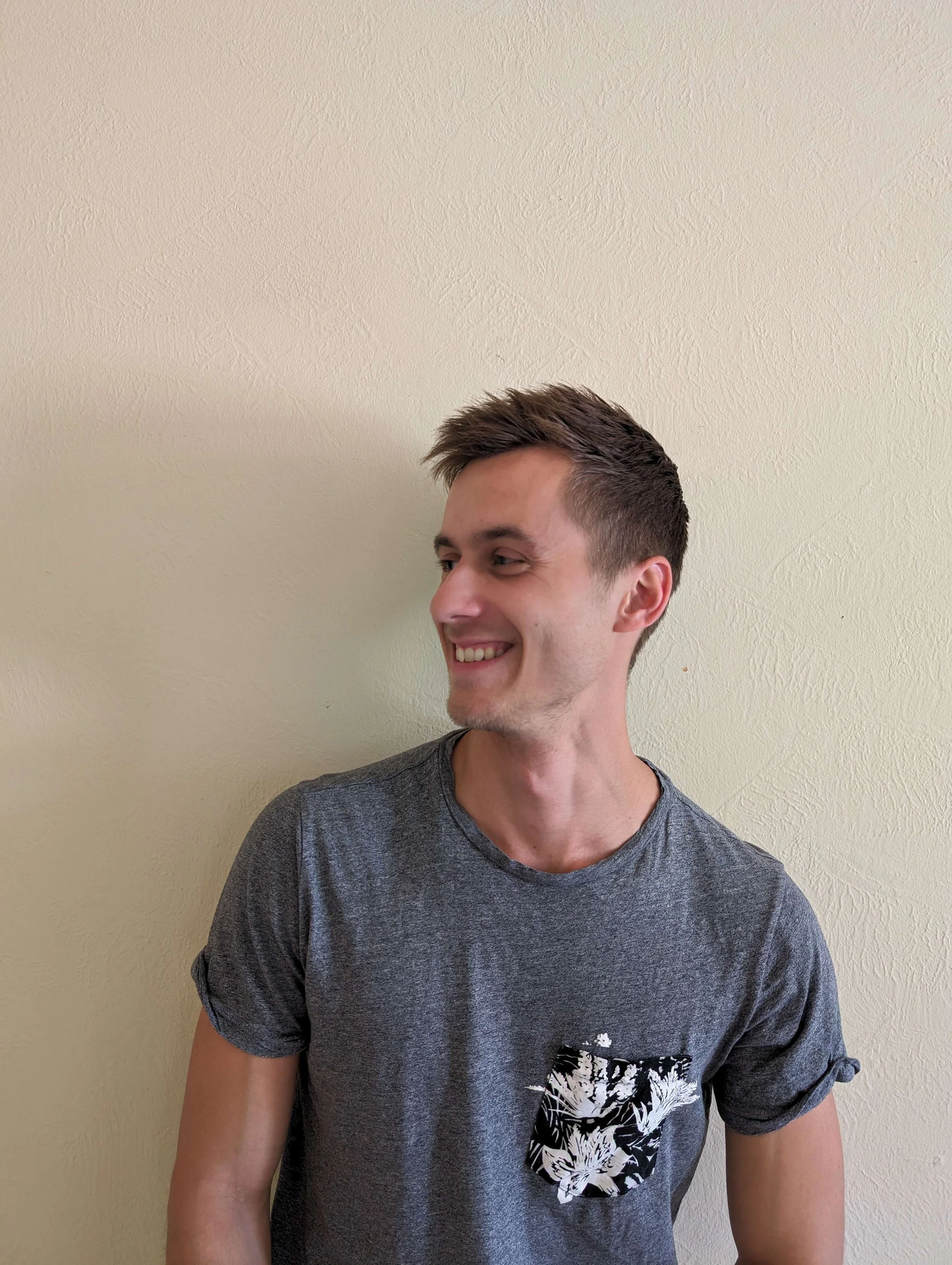 Nick Hewitt smiles at the text on the left lovingly, knowing that it is the first step to making a new human connection.