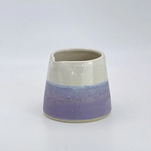Pourer in orchid and white