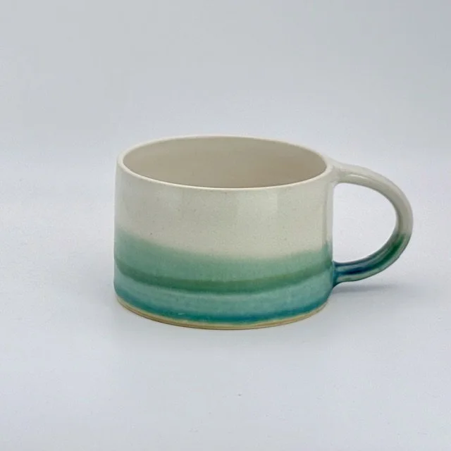 Turquoise green and white squat mug