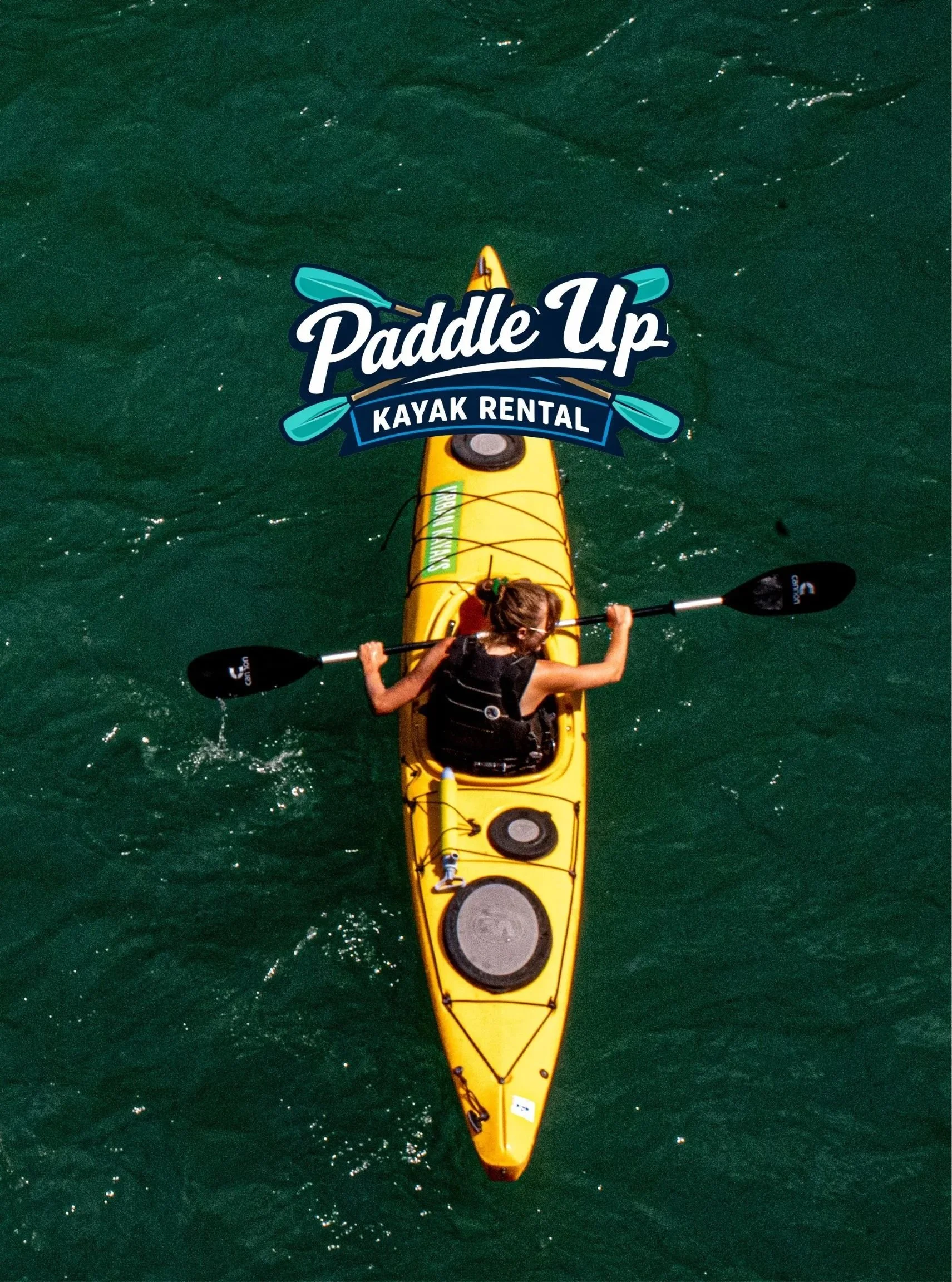 A woman kayaking on green water in a yellow kayak with a Paddle Up Kayak Rental logo overlay.
