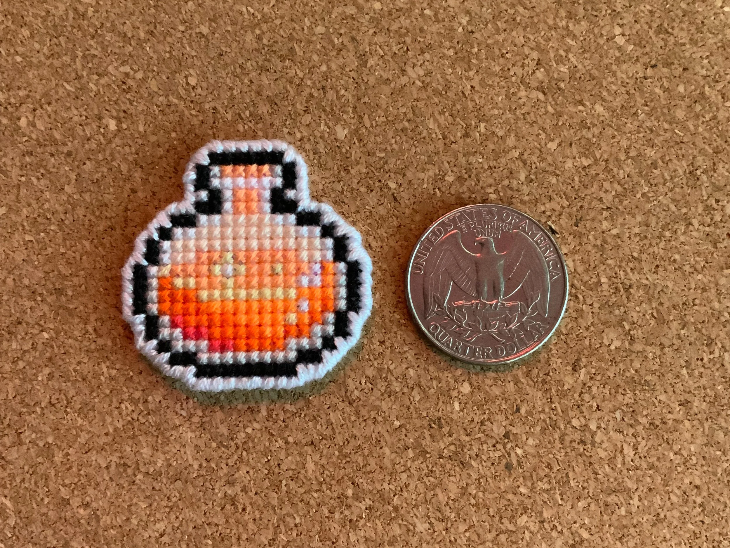 pick-your-poison-handmade-cross-stitch-pin-size.jpg