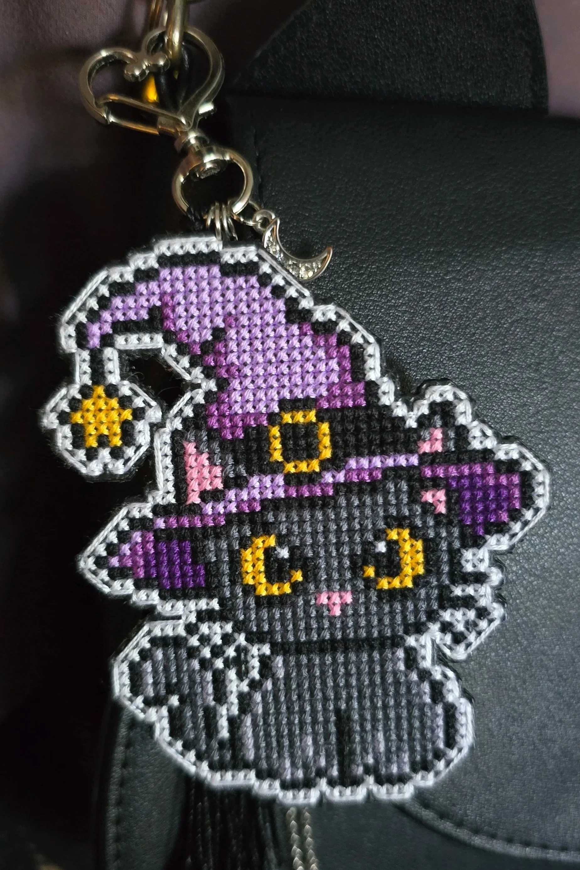 resting-witch-face-cross-stitch-purse-charm.jpg