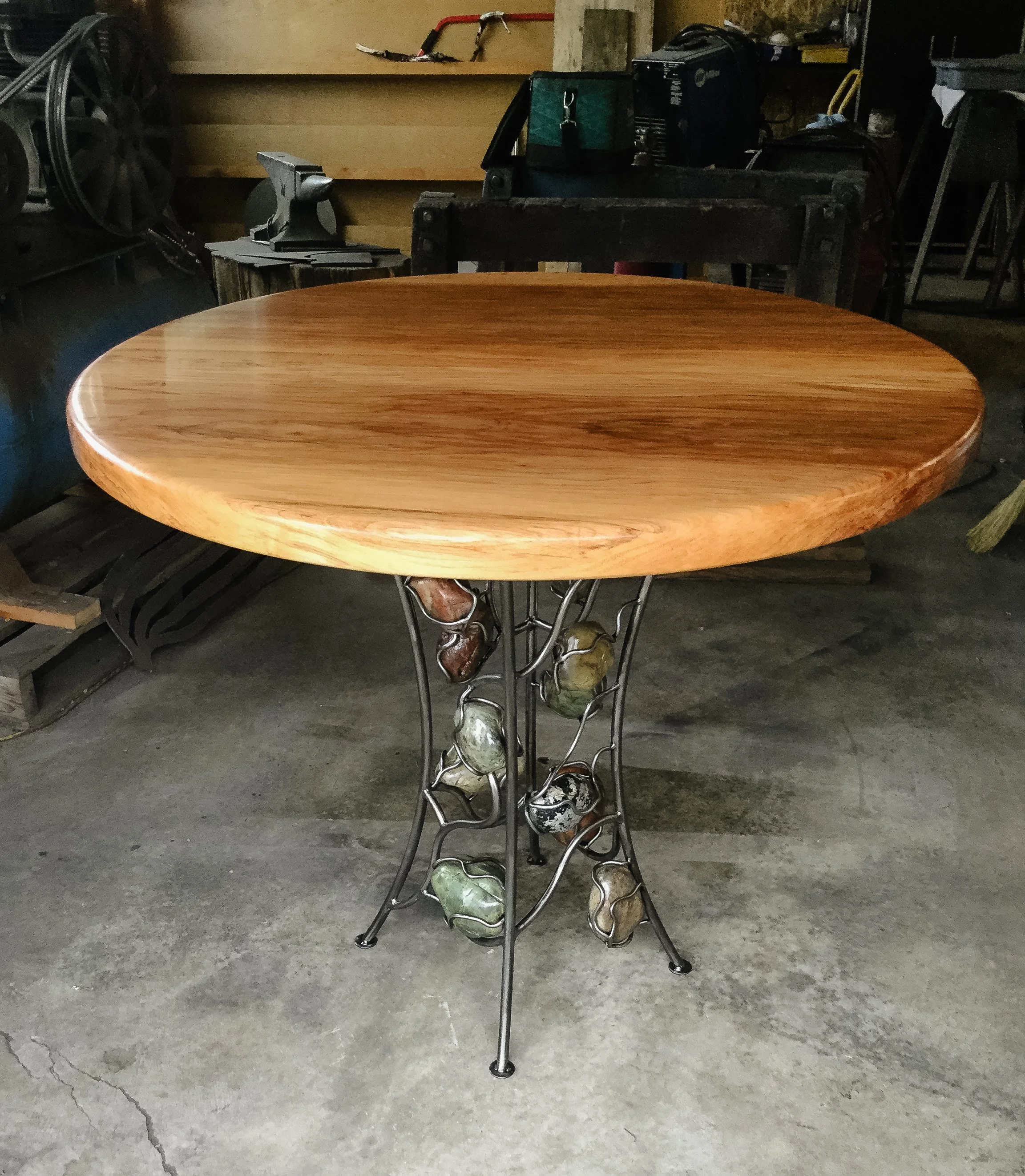 custom-round-dining-table-forged-steel-stone-pedestal-lethbridge.jpg