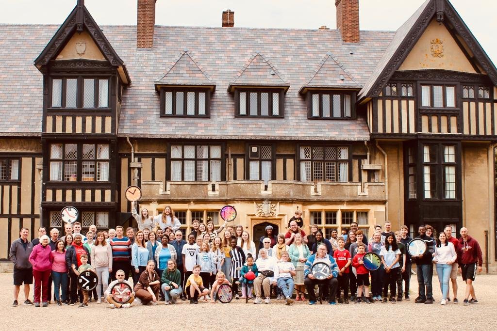 Group of people standing in front of Sizewell Hall
