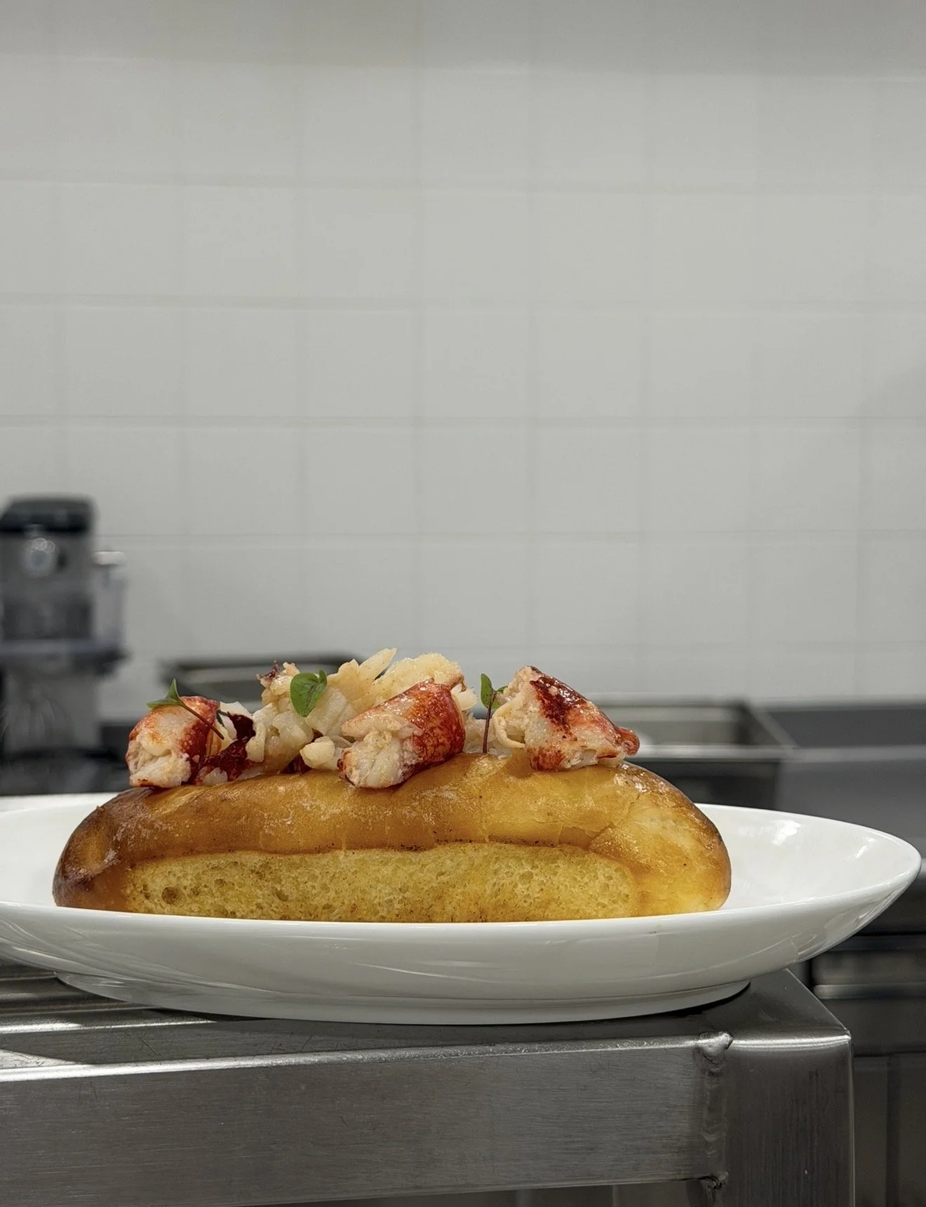 Lobster served on a soft roll