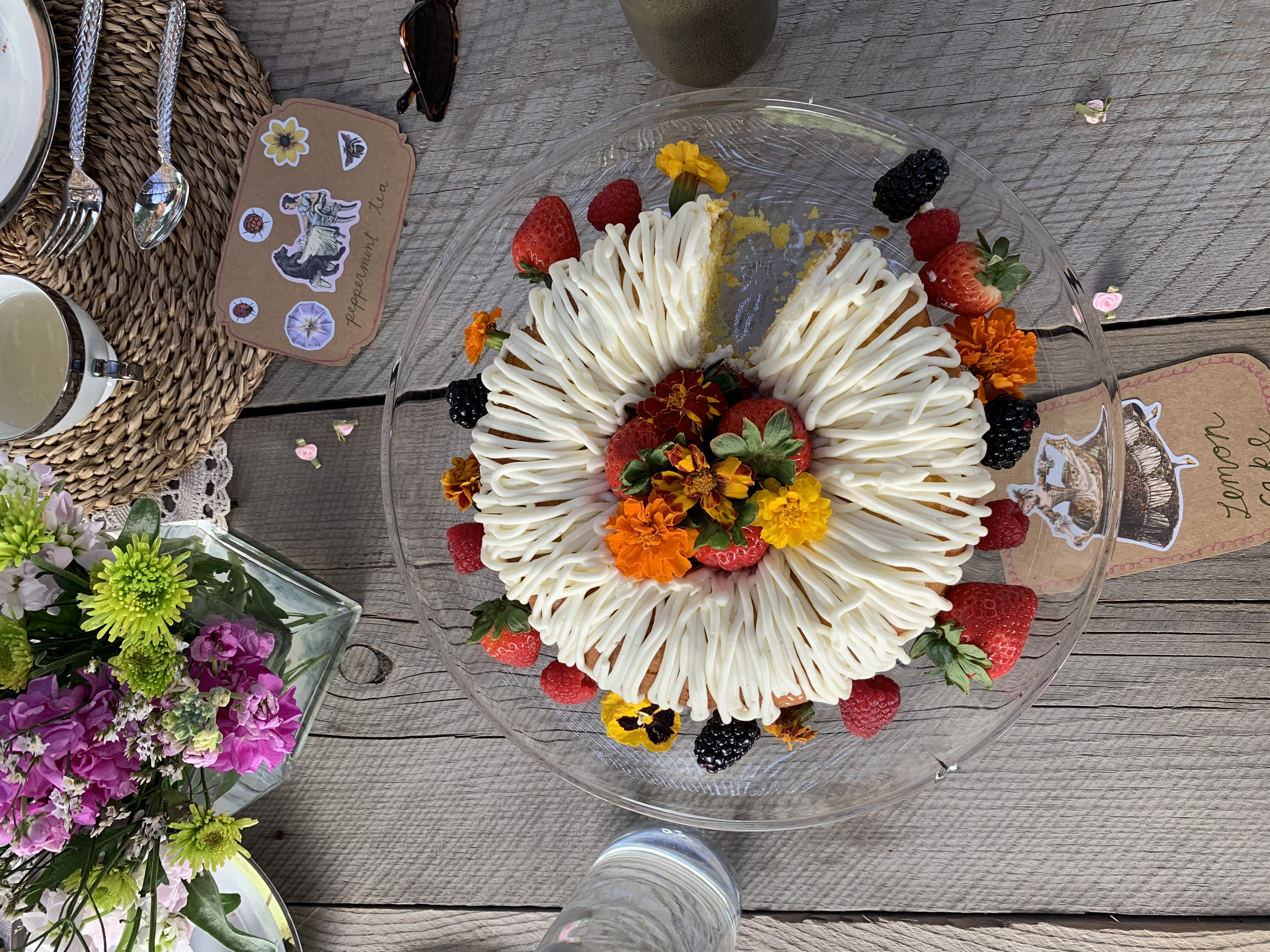 Floral dessert with fresh berries and delicate piping