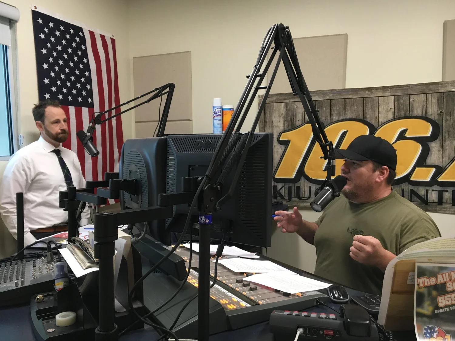 photo of two men at a radio station