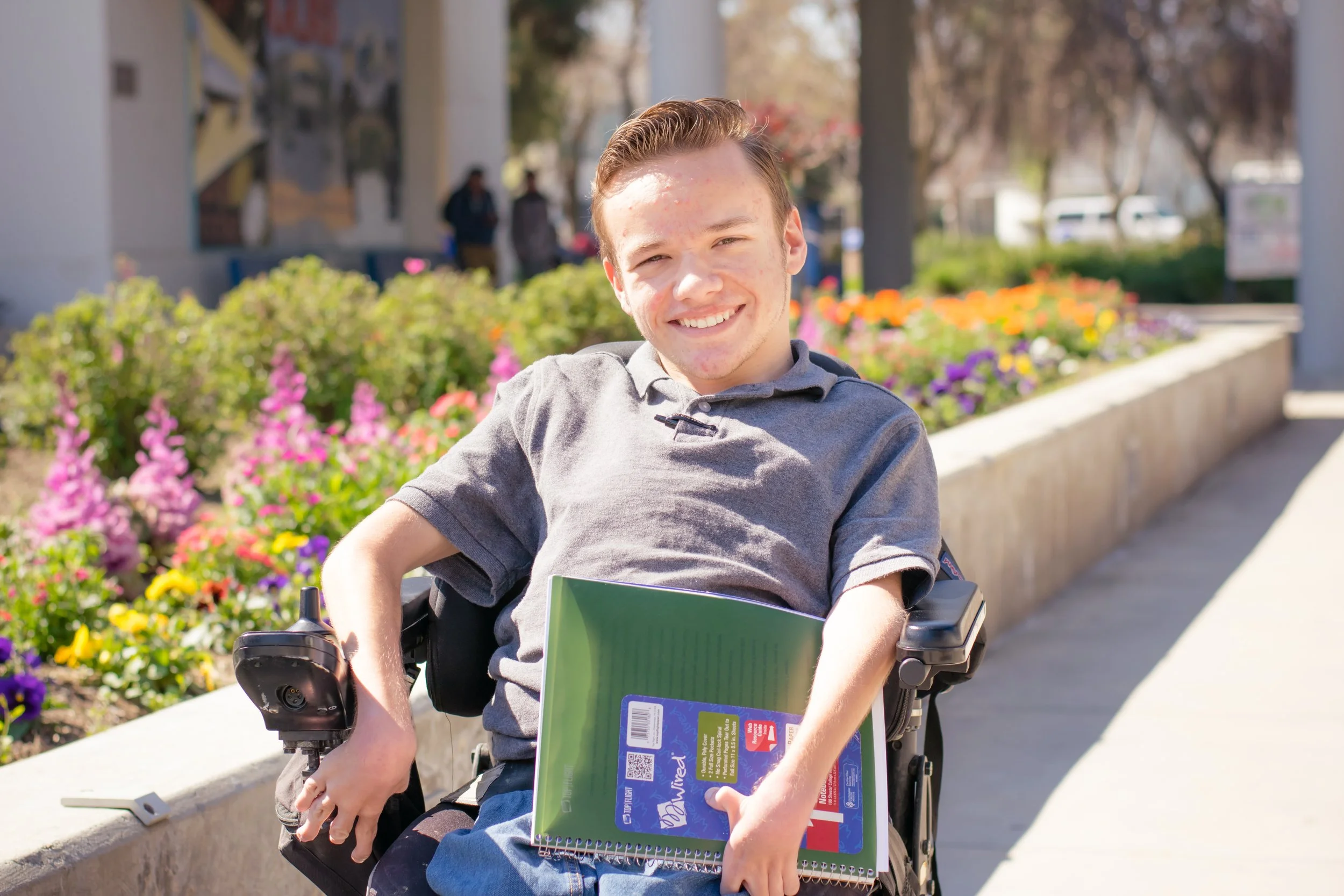 man in a wheelchair on his way to work