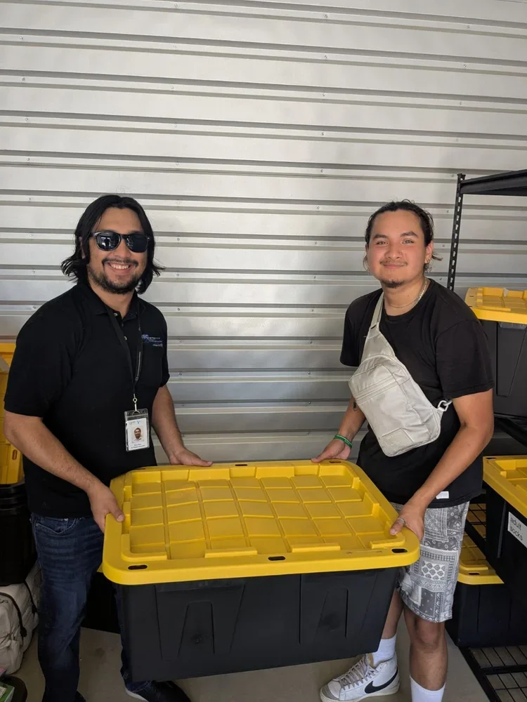 two men organizing a warehouse