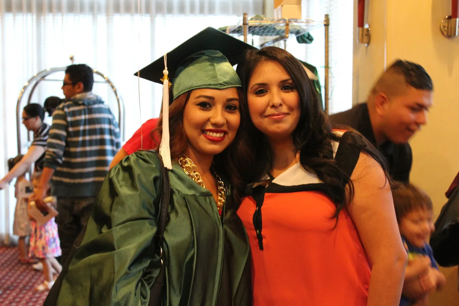 mom and daughter on her daughters graduation day