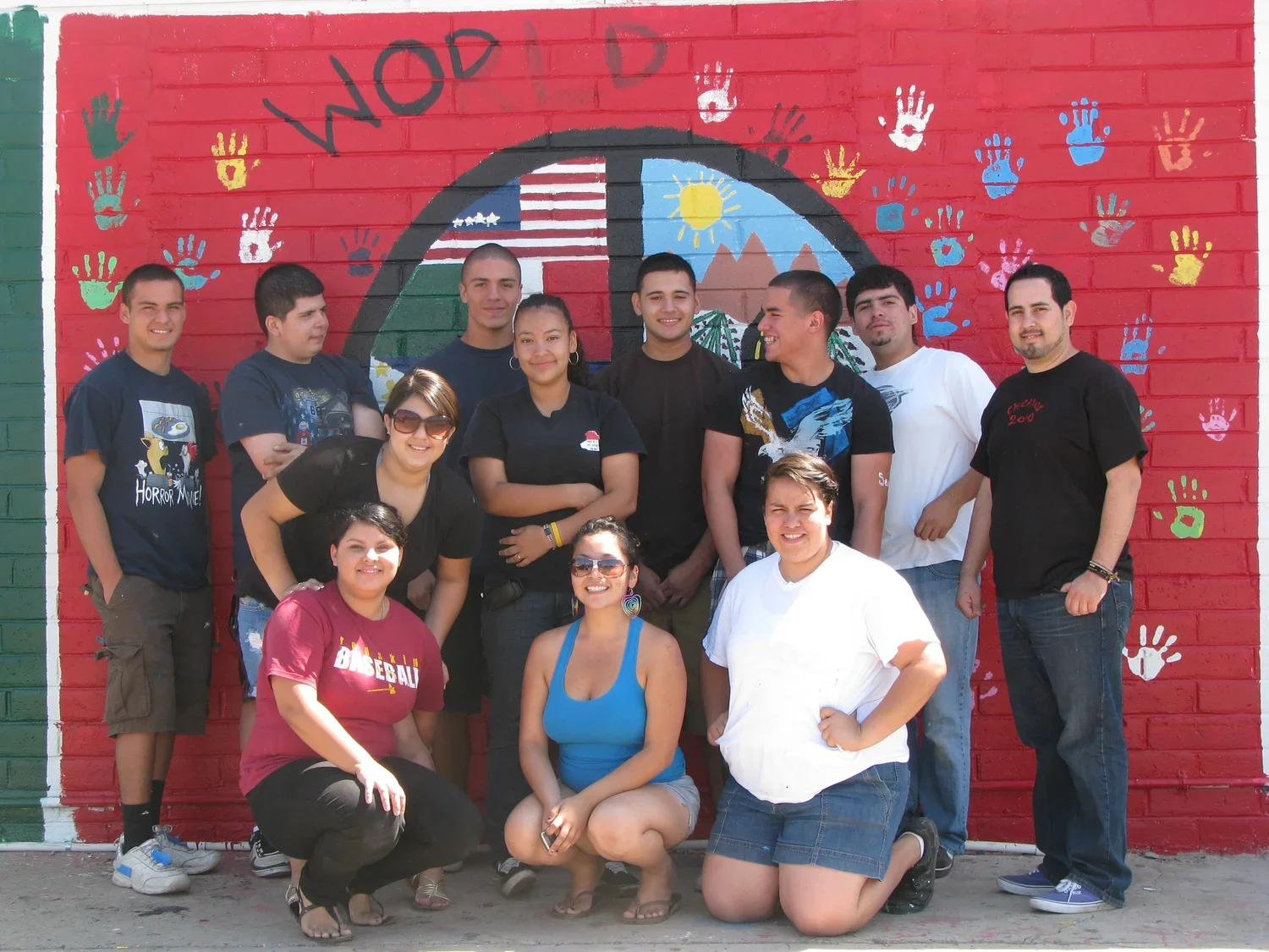 group photo infant of a painted mural
