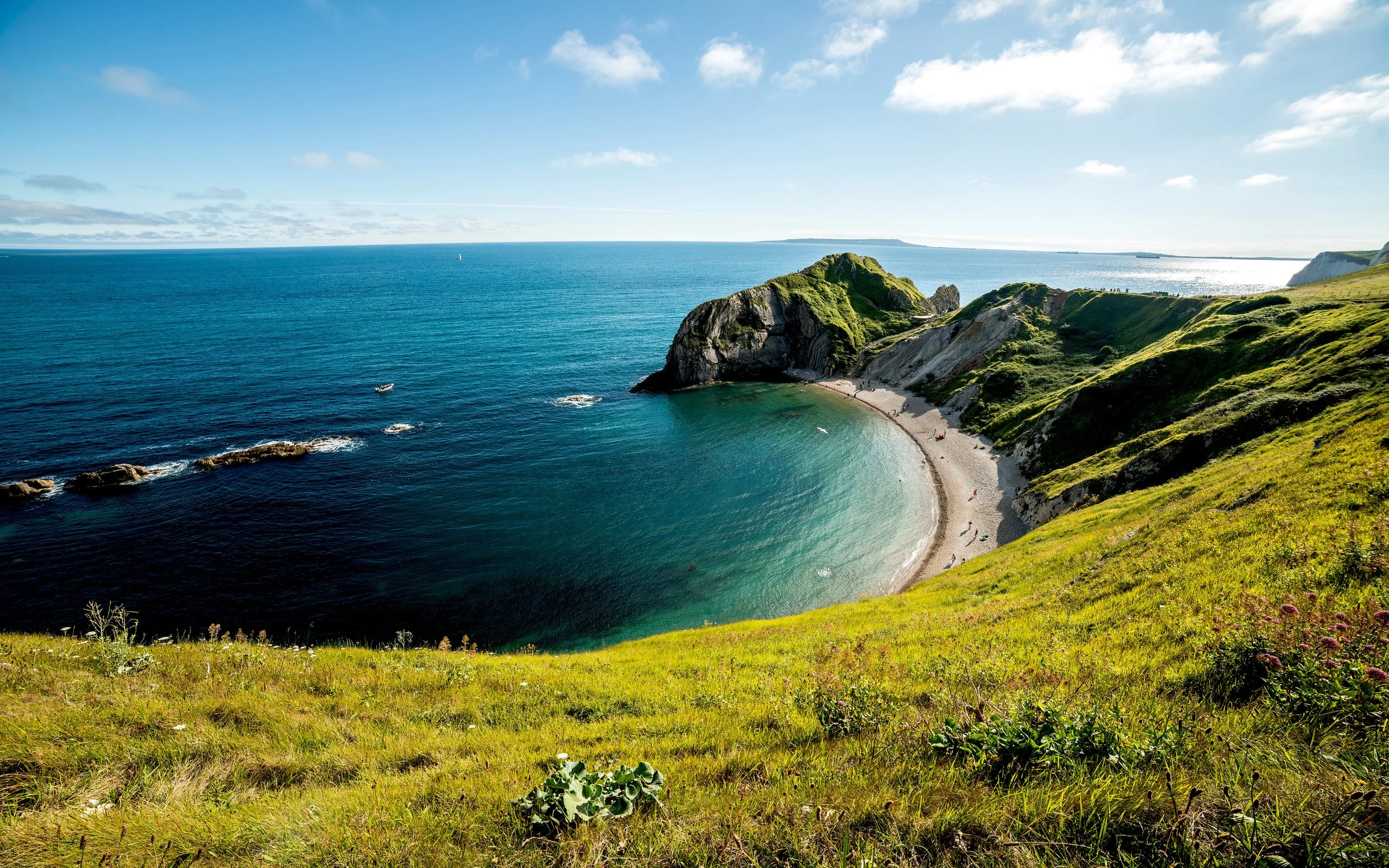 aerial picture of durdle door and the Dorset coastline.