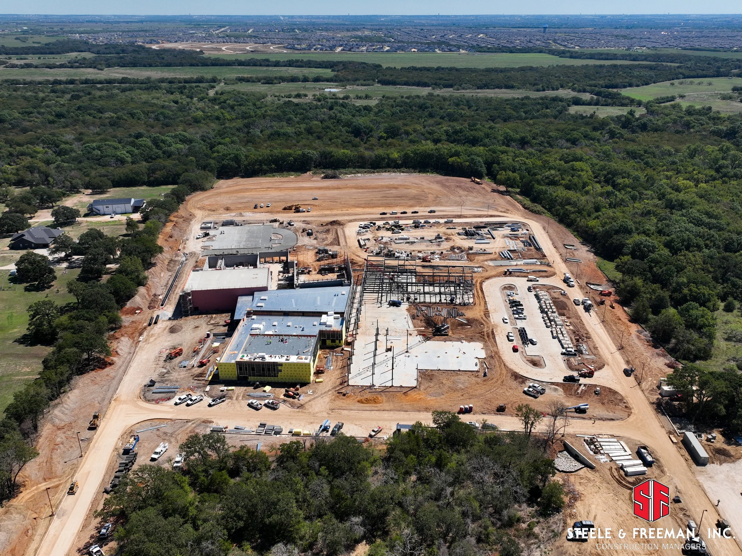 Exterior construction progress at Aubrey ISD new middle school campus.