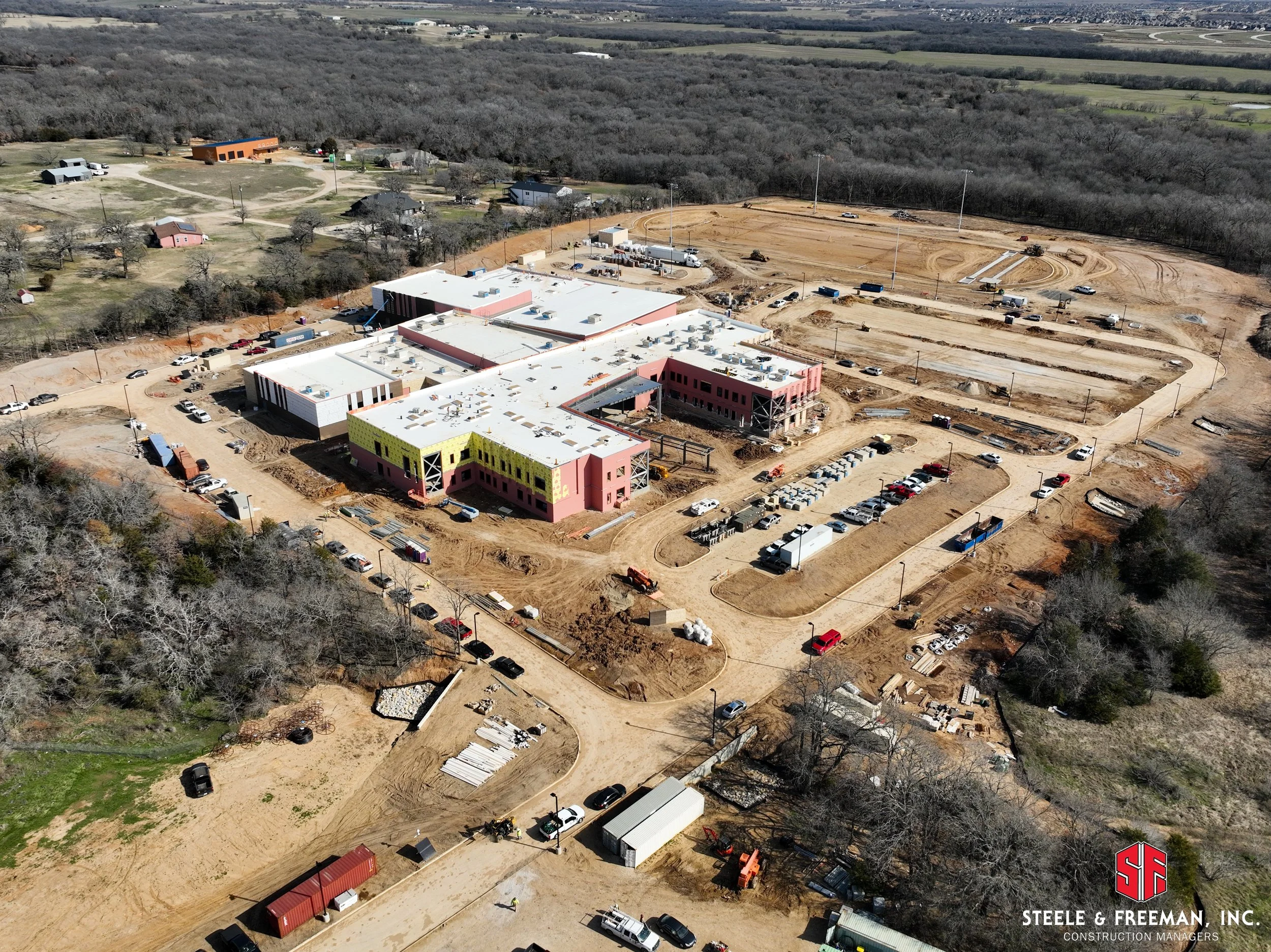 Construction crews working on Evalois Owens Middle School bond-funded project.