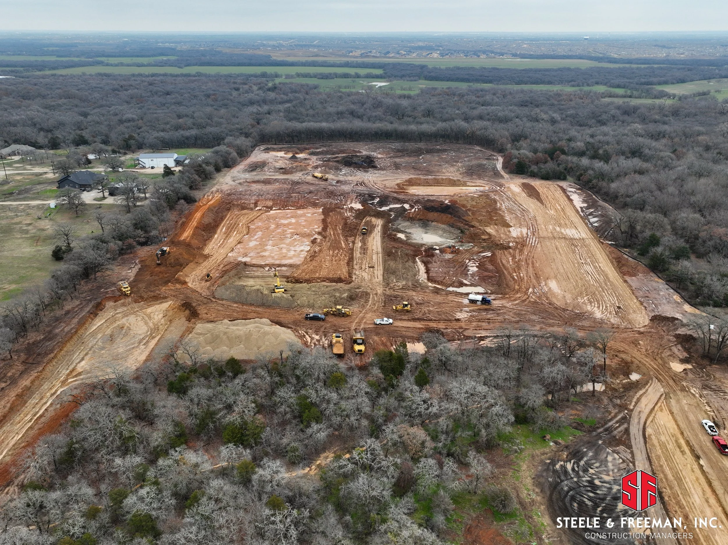 Earthwork and grading underway at Evalois Owens Middle School site in Aubrey Texas.