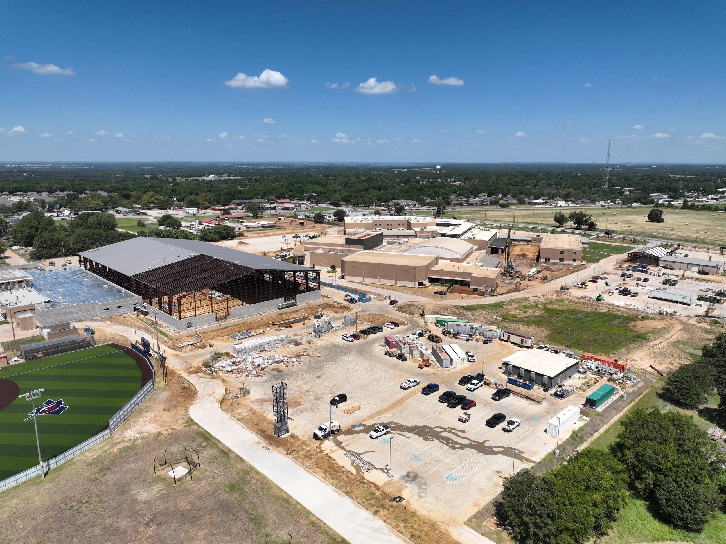 Roofing installation at Aubrey High School indoor practice facility.