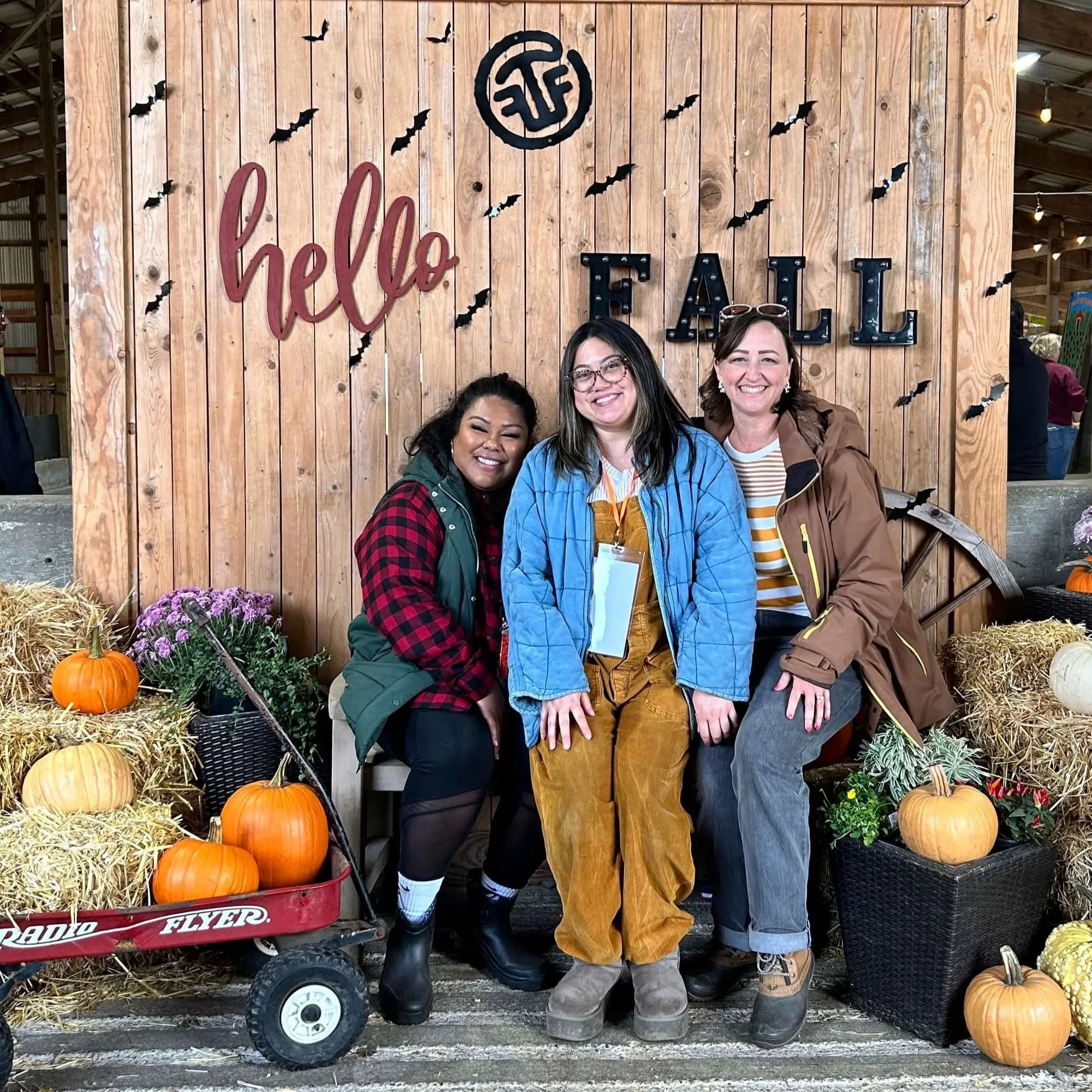 Adult leaders from Children’s Ministries pose for a picture at a pumpkin patch.