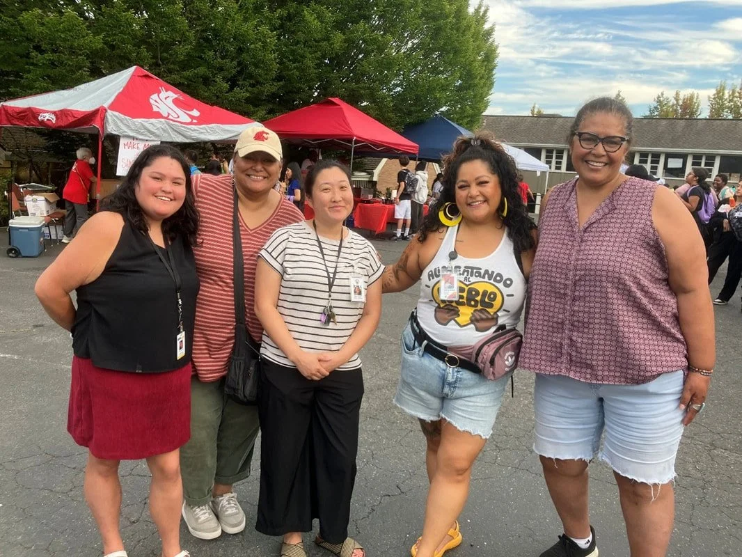Community leaders pause for a picture at Alimentando al Pueblo’s 2025 Back-to-School Bash at Lake Burien Presbyterian Church.