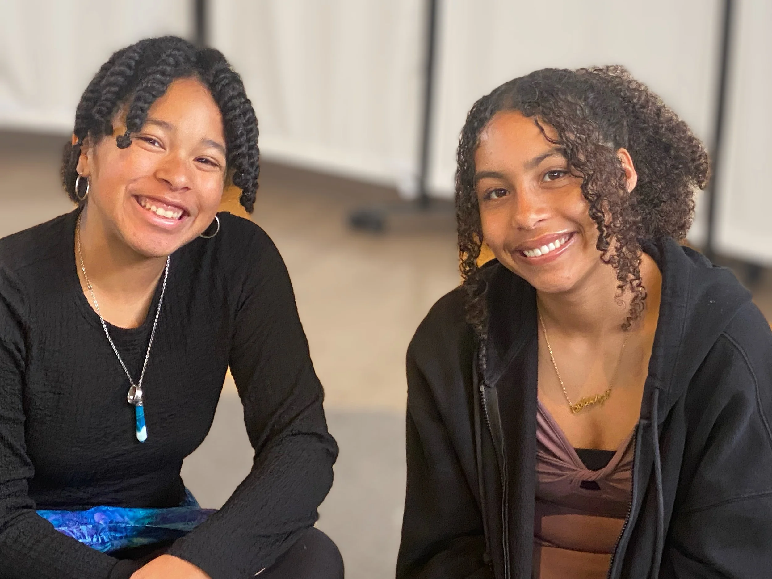 Hannah Farkas, Jr., and Ashlyn Davies pose for a picture in Fellowship Hall.