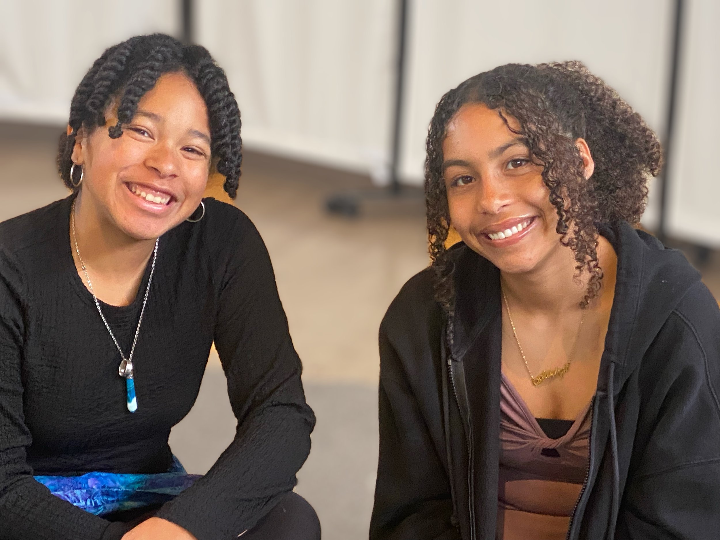 Hannah Farkas, Jr., and Ashlyn Davies pose for a picture in Fellowship Hall.