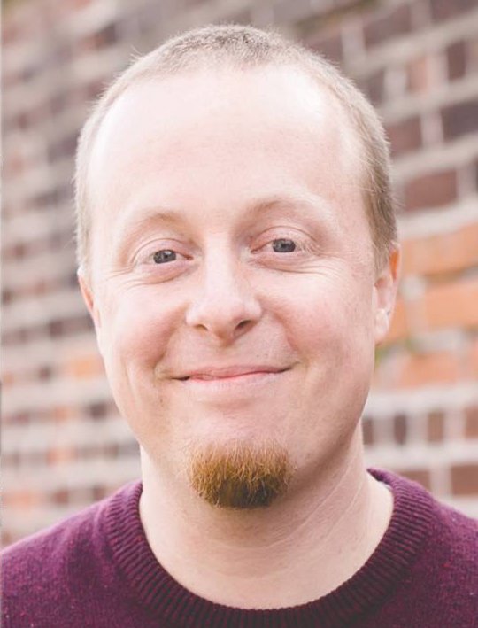 Portrait of Jeremy Secrest, Communications Director of BFit Gym.