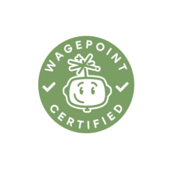 Green circular badge with a bow symbol in the center and the words "Vaccine Passport Certified" around the edge.