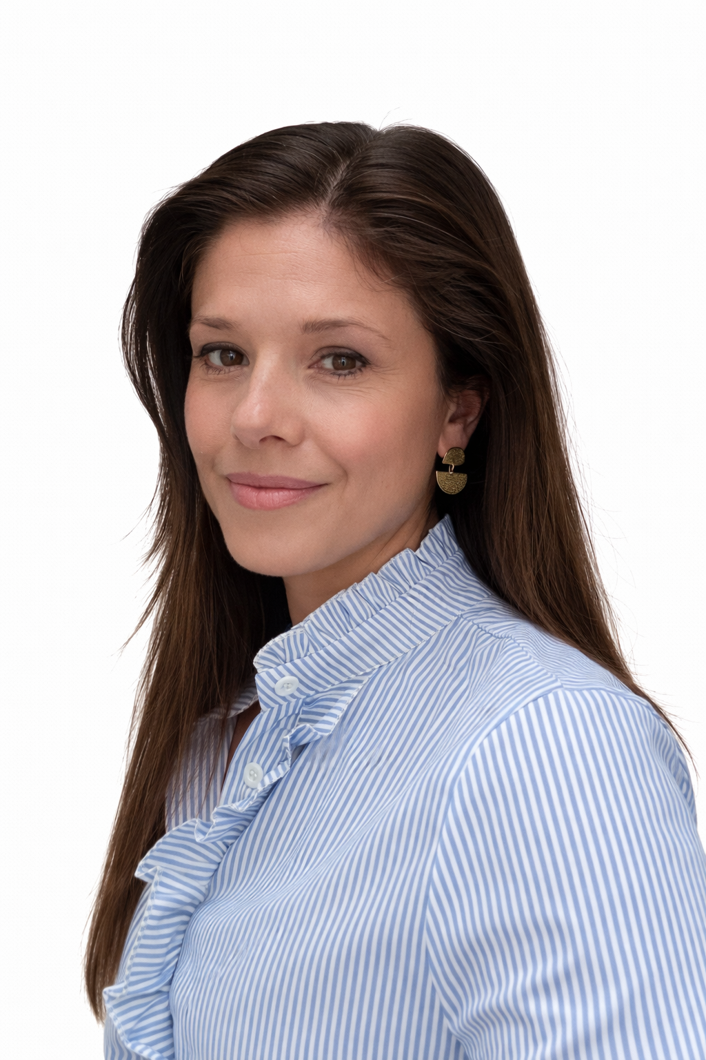 Portrait of a woman with long brown hair, wearing a blue and white striped blouse with ruffled collar, and gold earrings, against a white background.