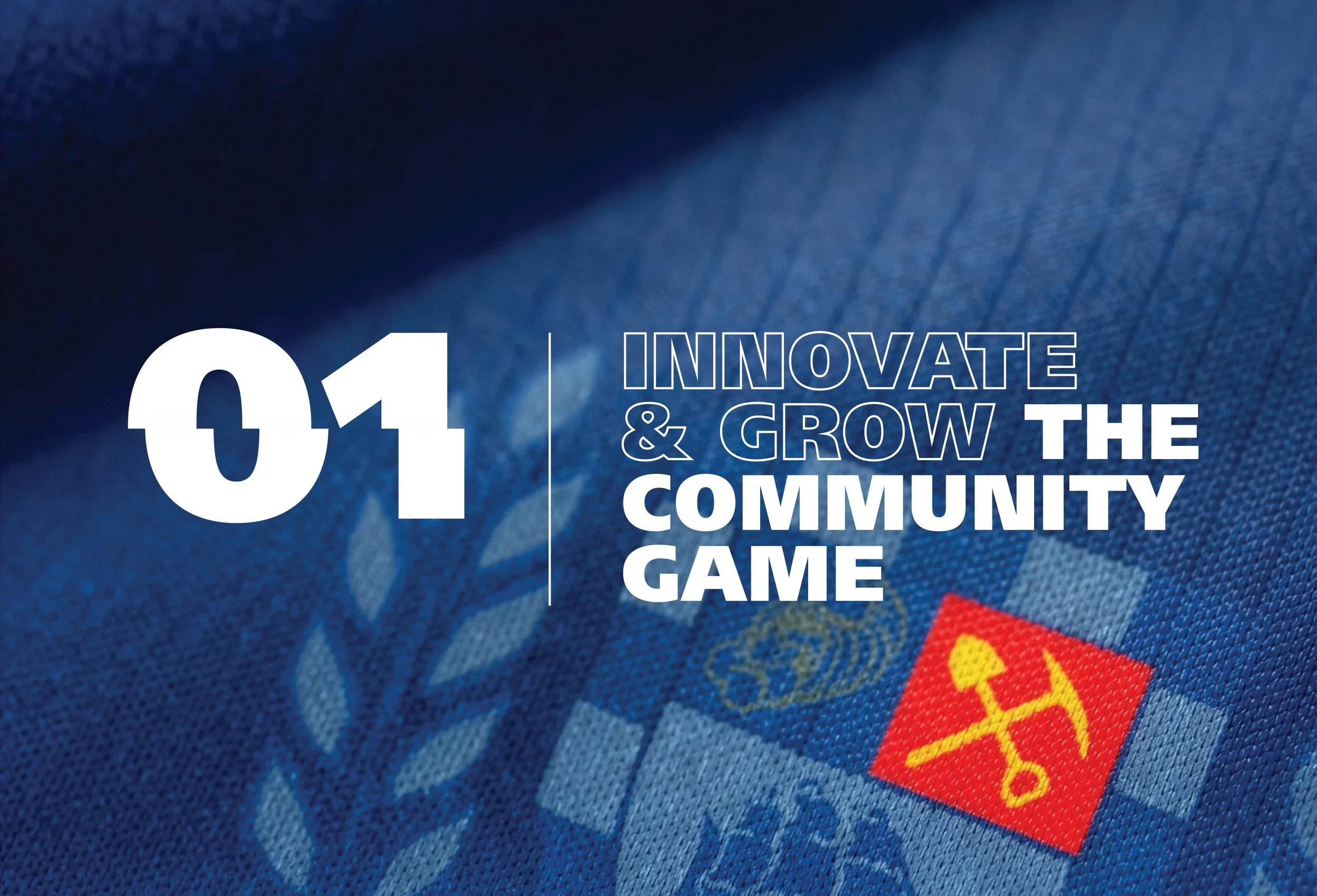 Close-up of a sports jersey or fabric with the text '01 | INNOVATE & GROW THE COMMUNITY GAME' over a blue textured background, possibly part of a sports team or event branding.