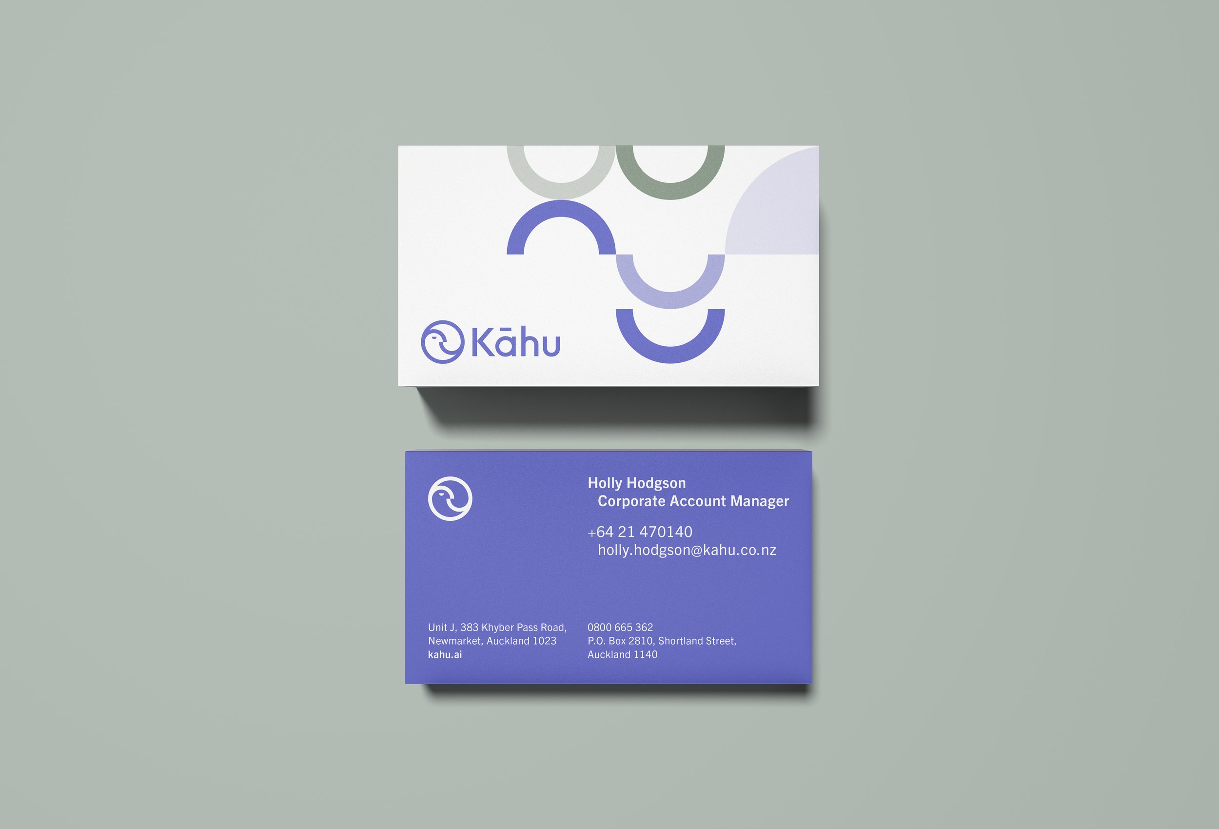 Business card and ID badge for Holly Hodgson, Corporate Account Manager at Kahu. The card features the Kahu logo, contact information, and company address, with a white and purple design.