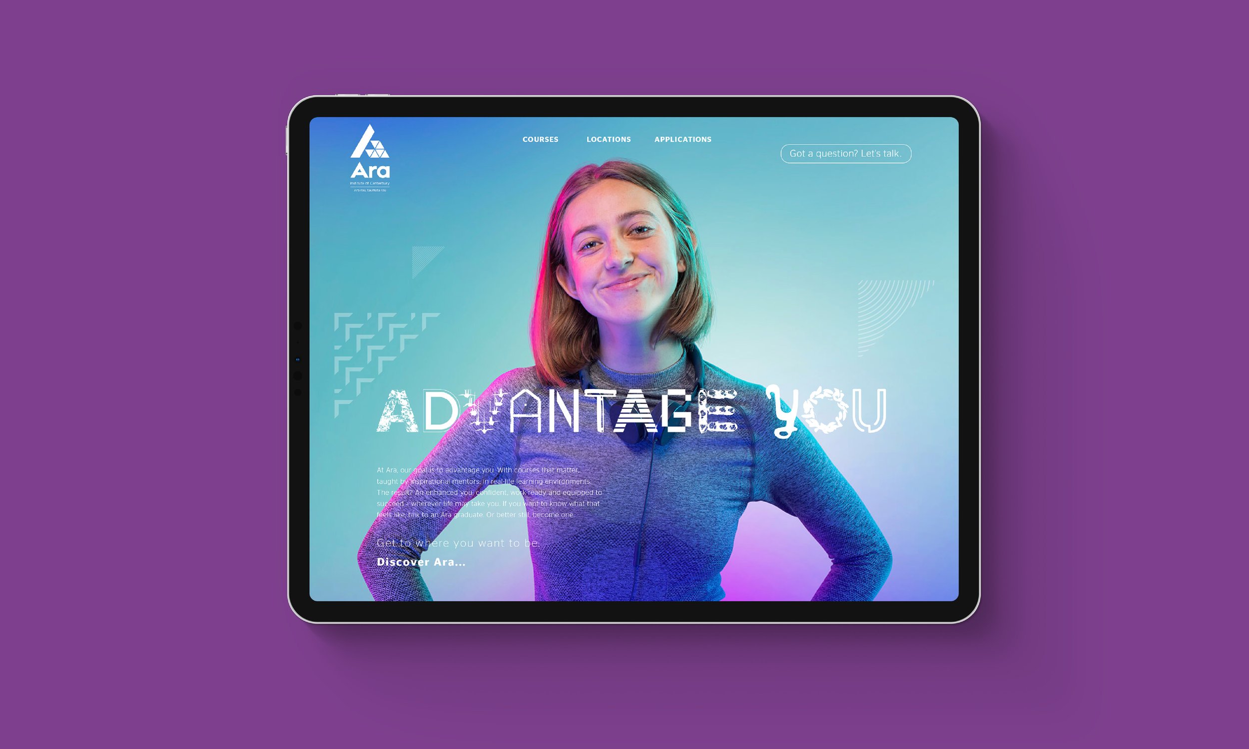 A tablet displaying a website with a smiling woman wearing a gray sweater, with colorful background and overlay text that reads 'ADVANTAGE YOU'.