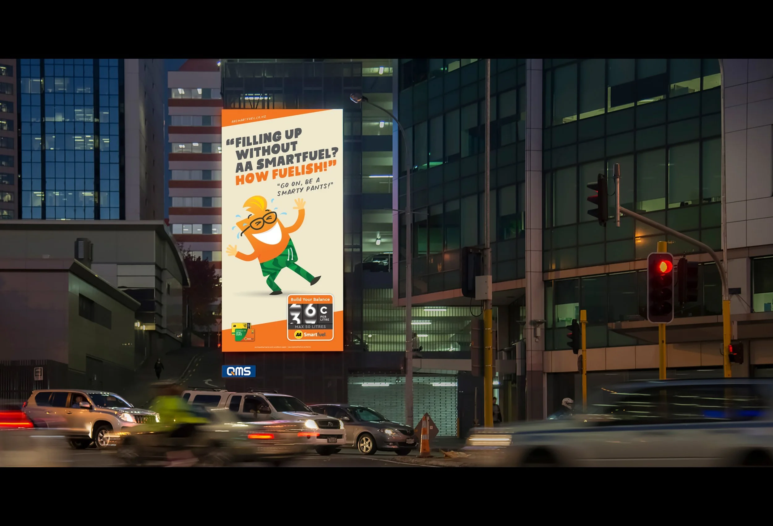 A city street scene at night with cars in motion, a tall glass building, and a large illuminated billboard advertising fuel prices and promoting smart fuel with a cartoon character.