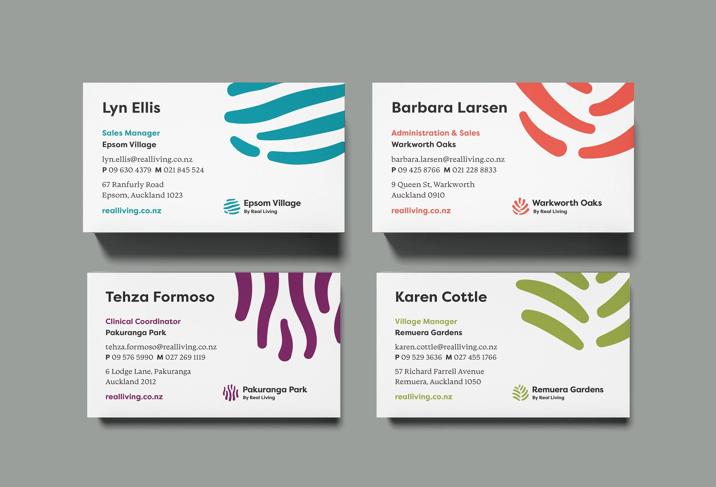 Business cards for different professionals, including a sales manager, an administration and sales person, a clinical coordinator, and a village manager, each with colorful abstract designs in the background.
