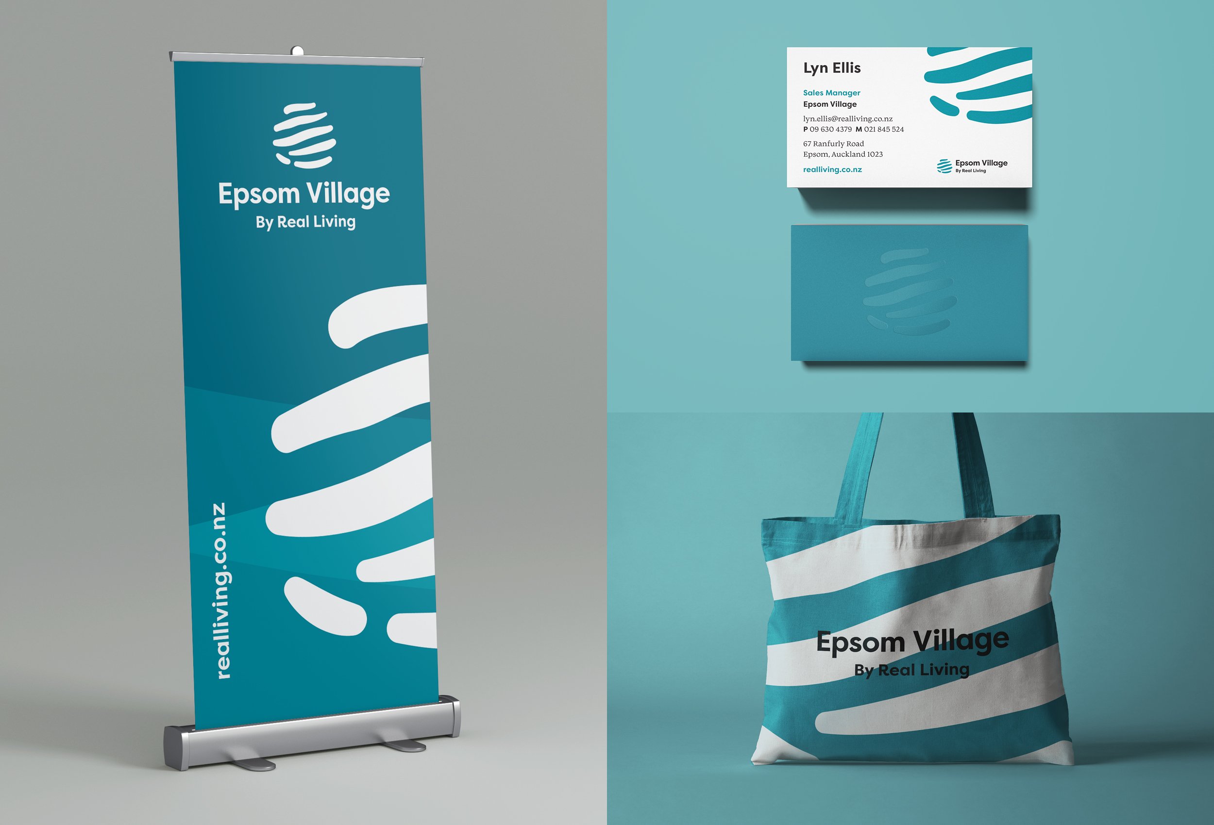 A blue vertical banner for Epsom Village with white wavy lines and text, positioned on a grey background. A business card and a paper bag with similar branding are also shown on a blue surface in the same style.