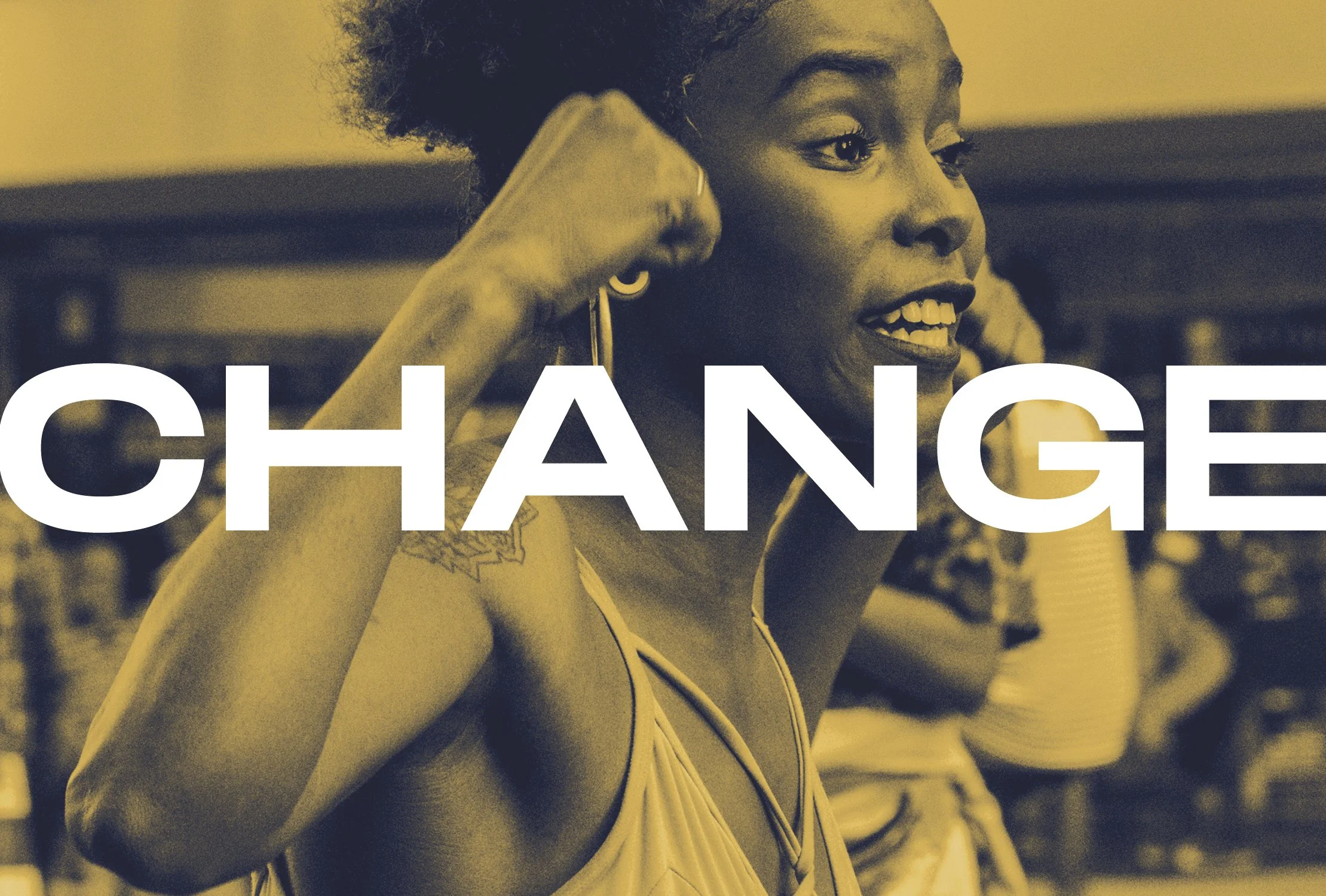 A woman smiling and raising her fist in a gesture of empowerment, with large white letters spelling "CHANCE" over her chest.