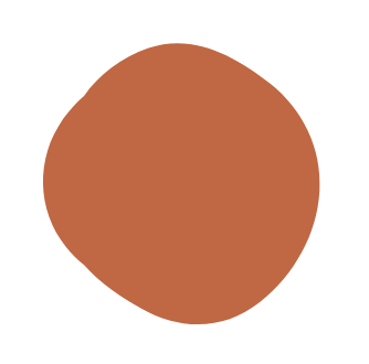A close-up of a brown apple with a stem, on a black background.