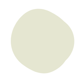 A light-colored, rounded stone or pebble on a black background.