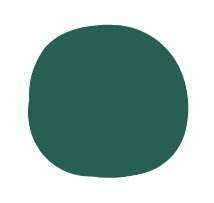 A dark green, irregularly shaped object with a rounded, uneven appearance.