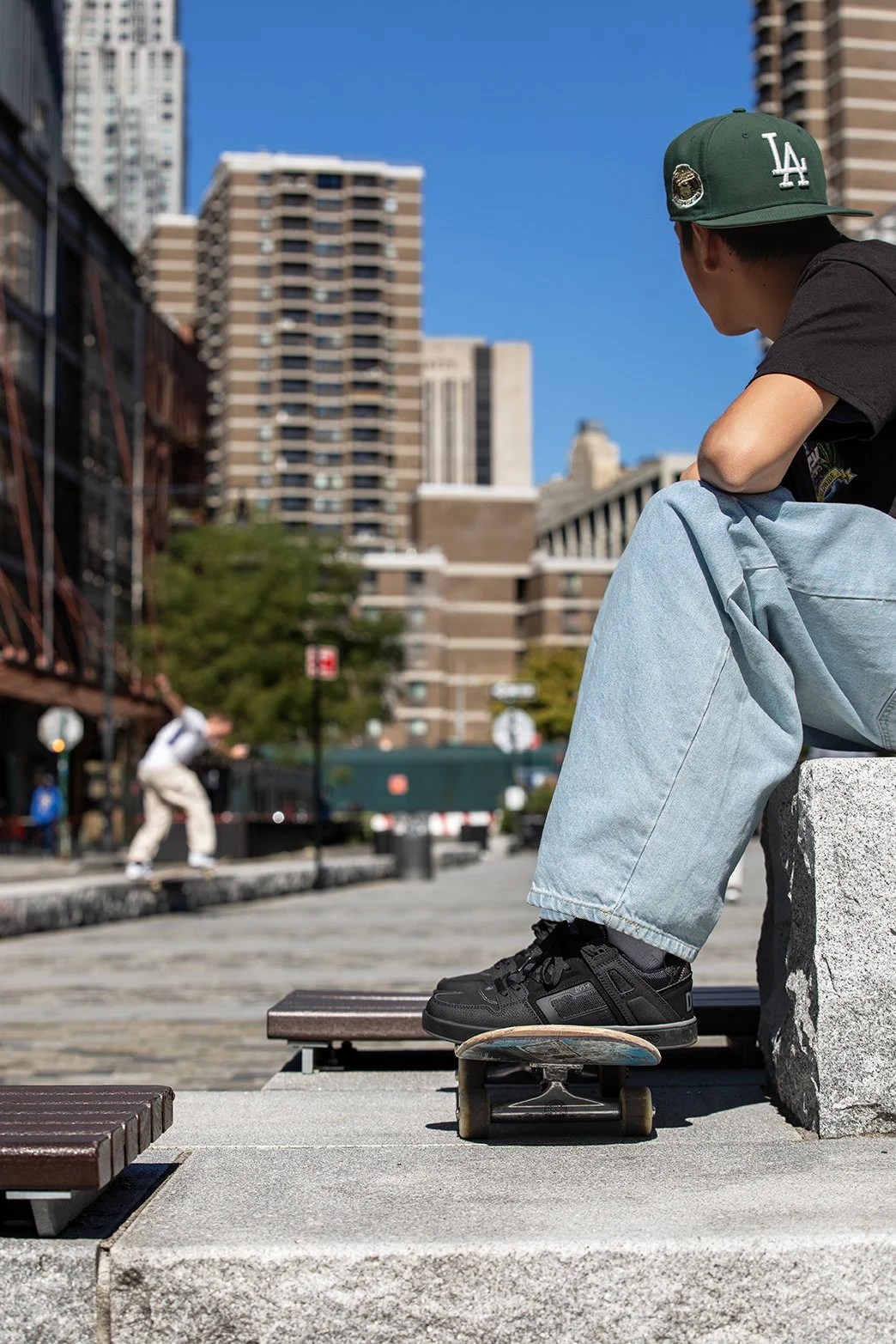 Steven watching Tyler skate ledge.jpg