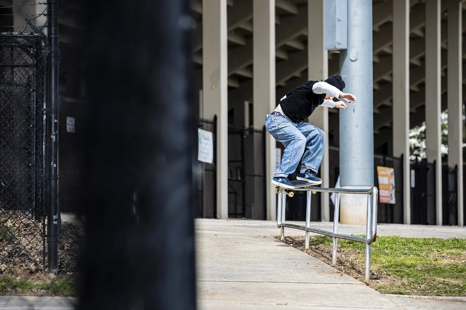Becker sw bs feeble long flatbar rail at school 2.jpg
