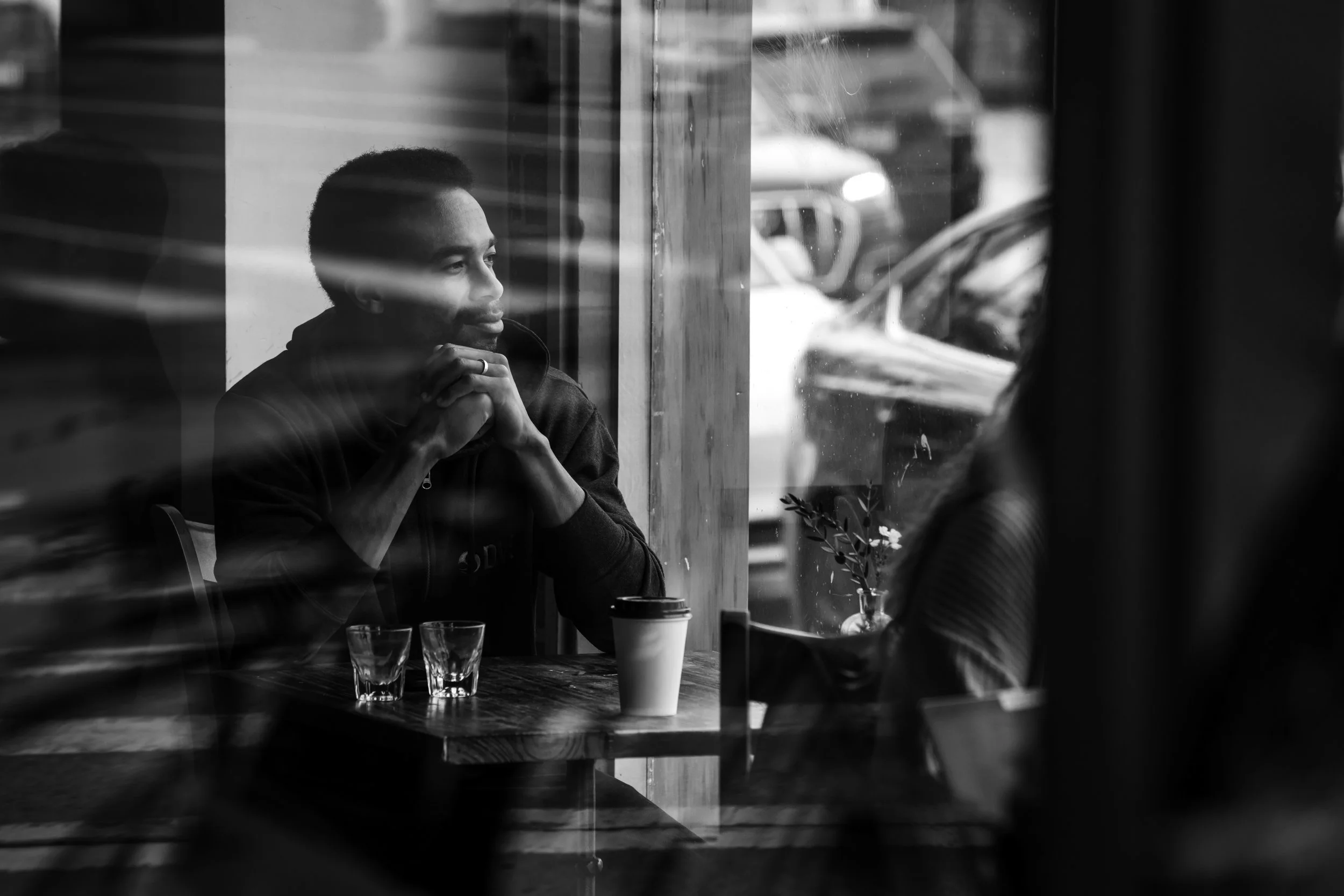 Timmy looking out coffee shop window.JPG