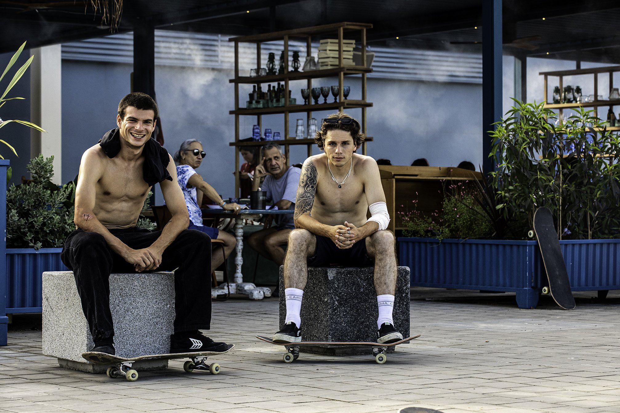 Levi & Justin sitting on blocks bts.jpg