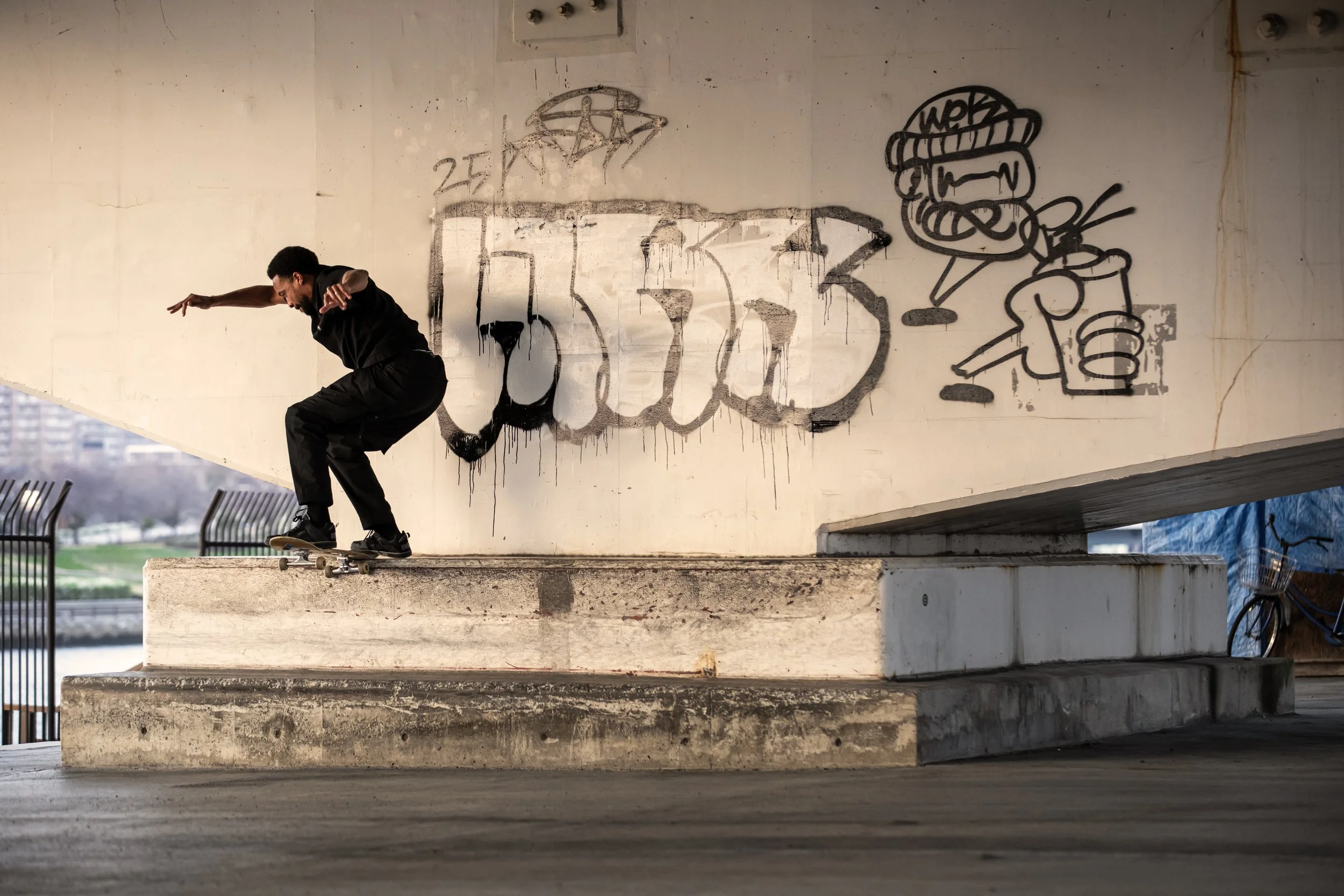 Timmy noseslide ledge under bridge.JPG