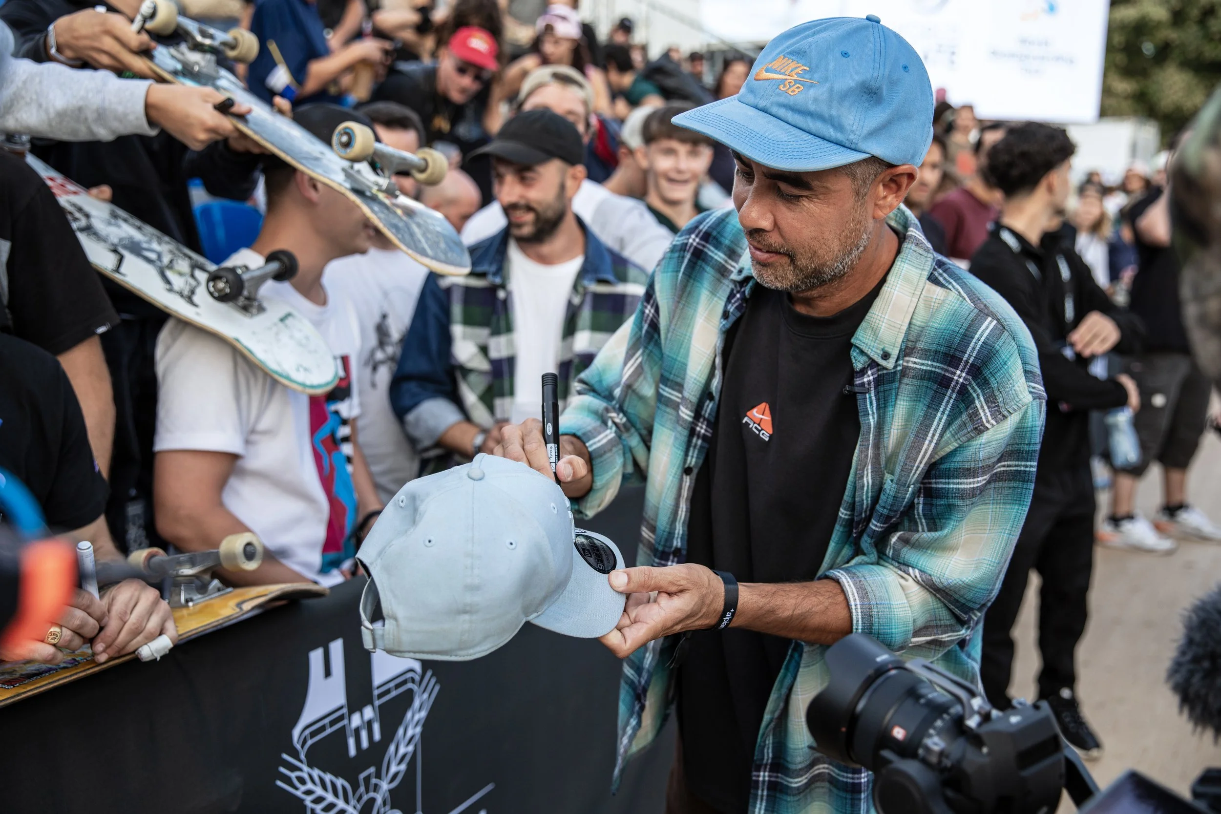 Koston signing fans hat.JPG