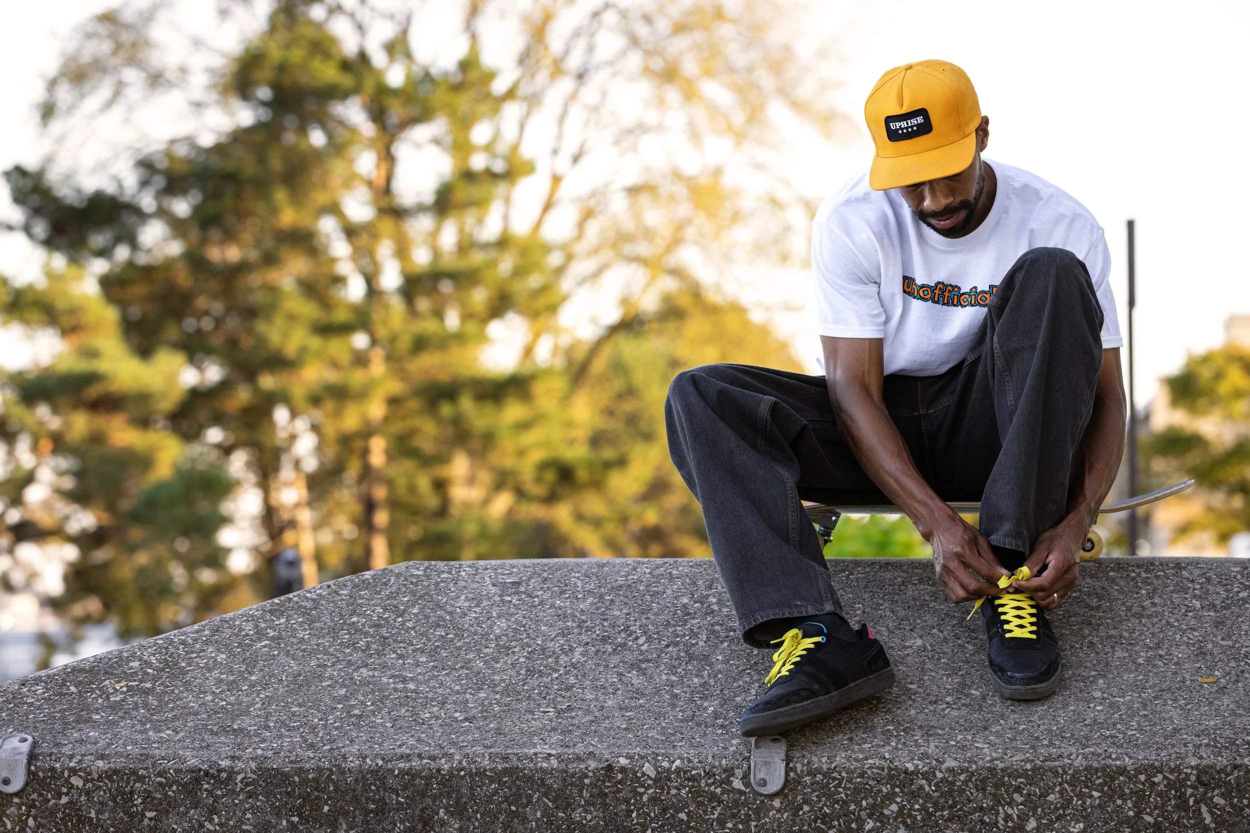 Timmy tying shoe on ledge at Pine Grove portrait.jpg